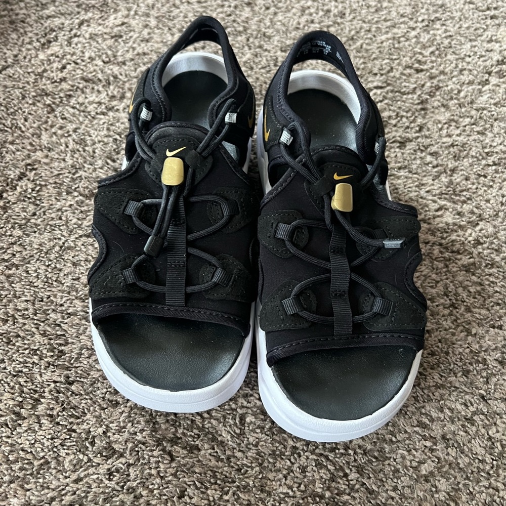 Women’s size 6 Nike Airmax Black and Gold Sandals